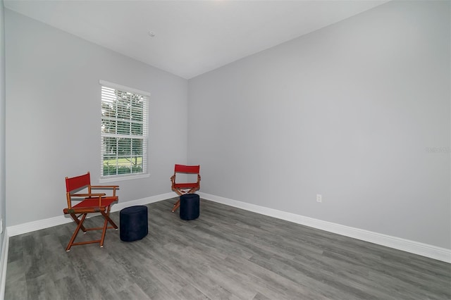 living area featuring dark hardwood / wood-style flooring