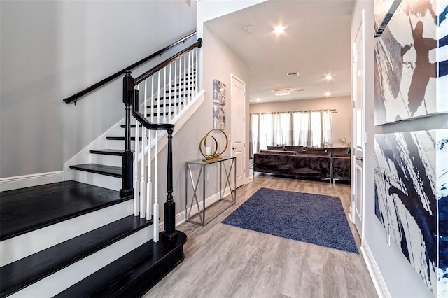 foyer entrance featuring light wood-type flooring