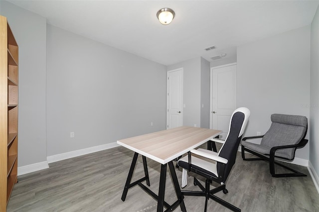 office area with hardwood / wood-style flooring