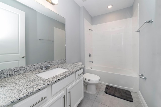 full bathroom featuring toilet, vanity with extensive cabinet space, tile floors, and tiled shower / bath combo