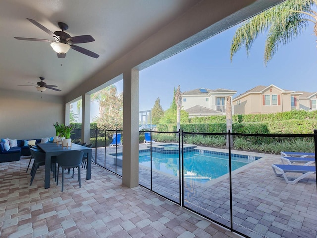 view of pool featuring a patio area and ceiling fan