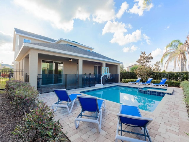 view of swimming pool with a patio