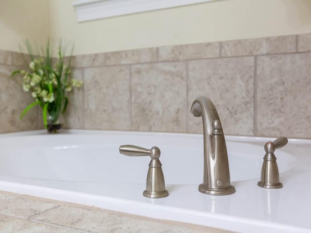 interior details featuring a bath to relax in