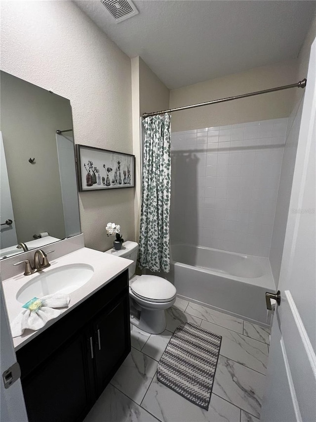 full bathroom with toilet, tile floors, vanity, and shower / bath combo with shower curtain