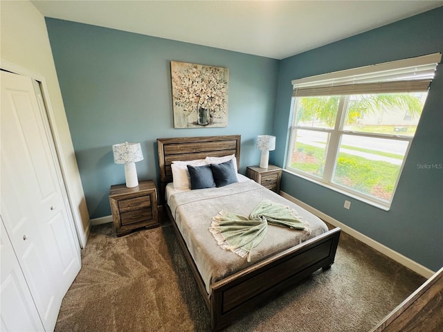 carpeted bedroom featuring a closet