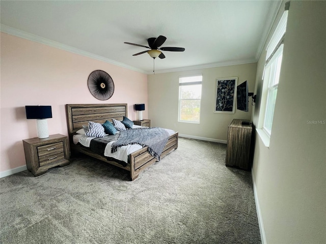 carpeted bedroom featuring ornamental molding and ceiling fan