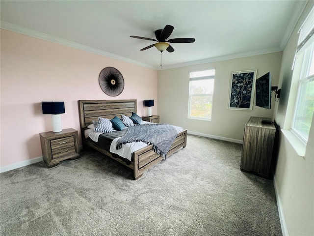 bedroom featuring ceiling fan, carpet floors, and ornamental molding