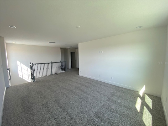 spare room featuring carpet flooring