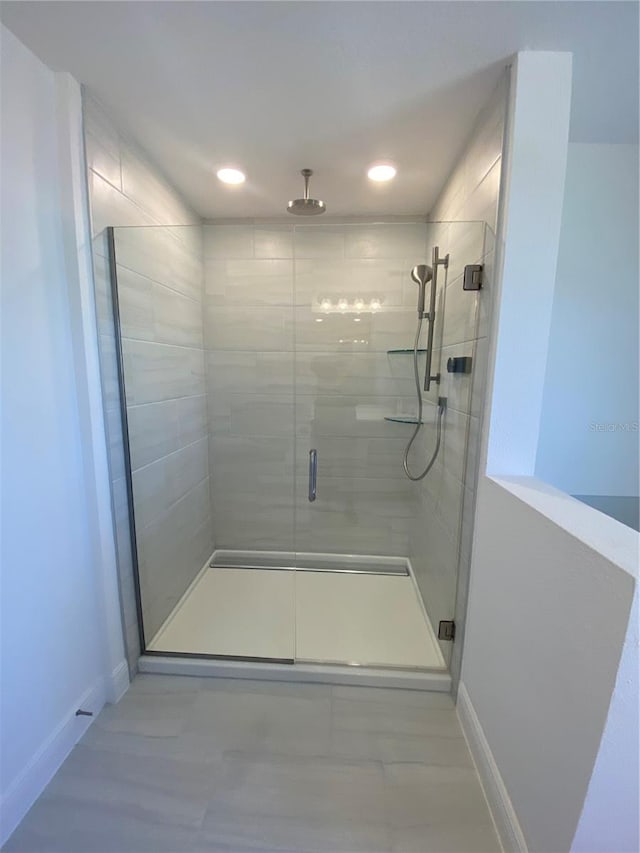 bathroom featuring walk in shower