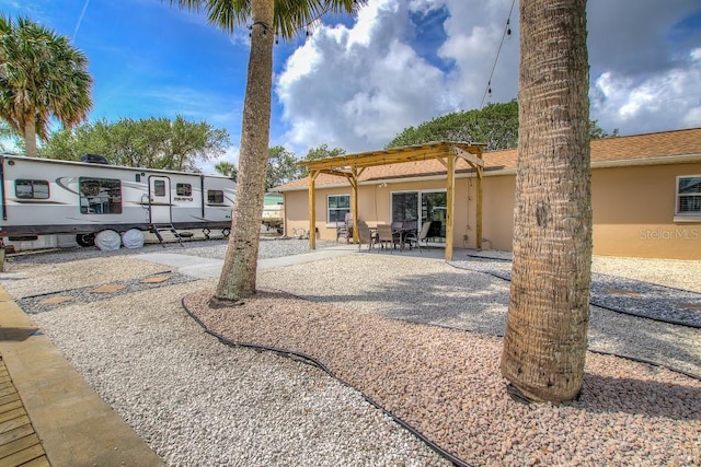 view of front of property featuring a patio area