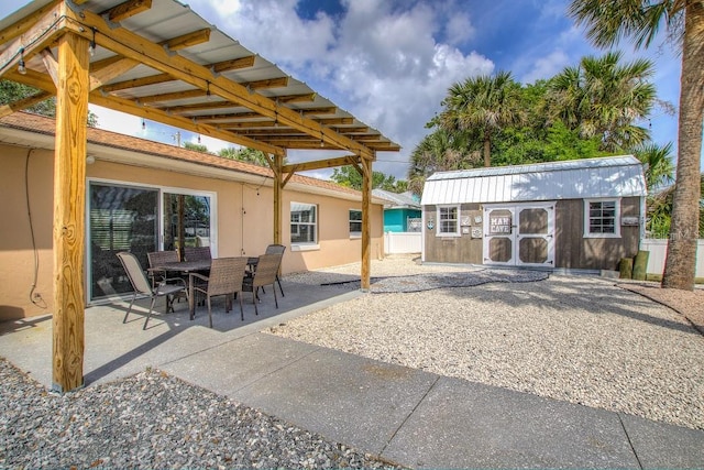 view of patio featuring an outdoor structure