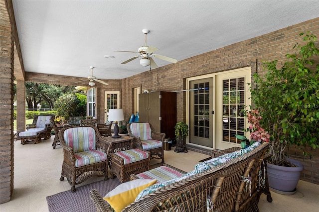 view of patio / terrace with outdoor lounge area and ceiling fan