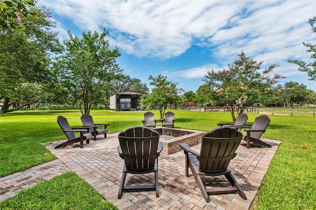 view of terrace featuring a fire pit