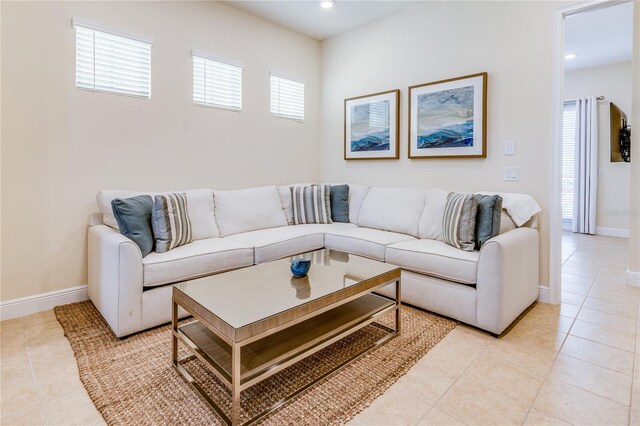 living room with light tile flooring