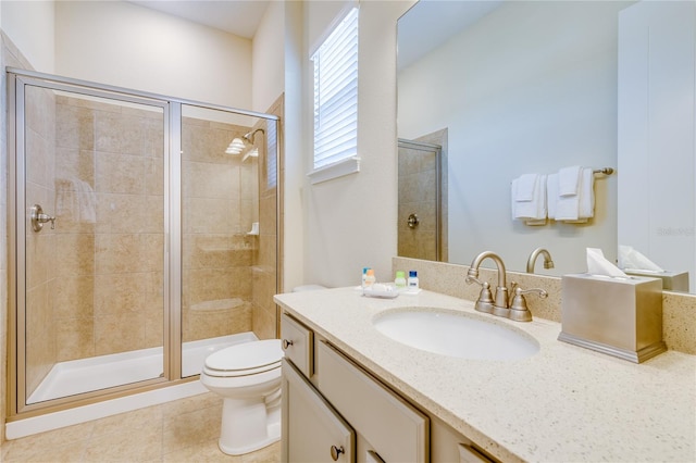 bathroom with tile floors, toilet, walk in shower, and oversized vanity