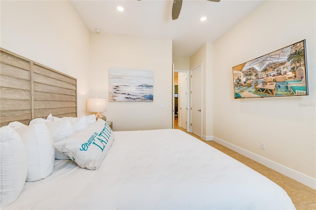 bedroom featuring a closet, light carpet, and ceiling fan