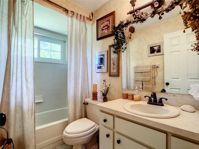 full bathroom with shower / tub combo with curtain, vanity with extensive cabinet space, and toilet