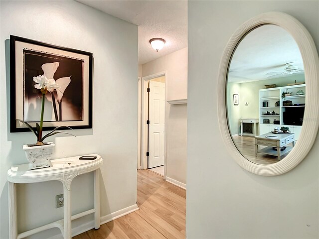 966 N Ronald Reagan Blvd, Longwood, FL 32750 - hallway featuring wood finished floors and baseboards