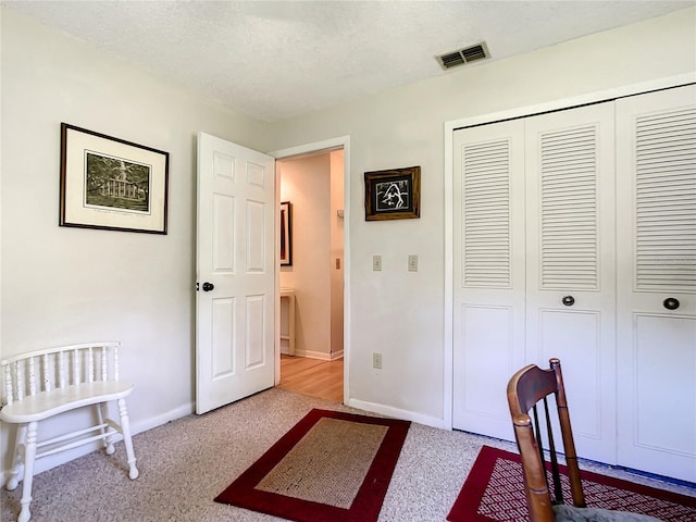 966 N Ronald Reagan Blvd, Longwood, FL 32750 - unfurnished bedroom with a closet, carpet floors, a textured ceiling, and baseboards