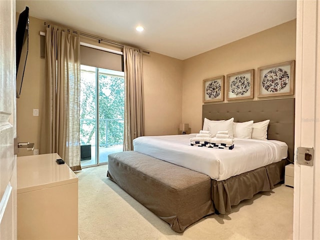 carpeted bedroom with access to outside