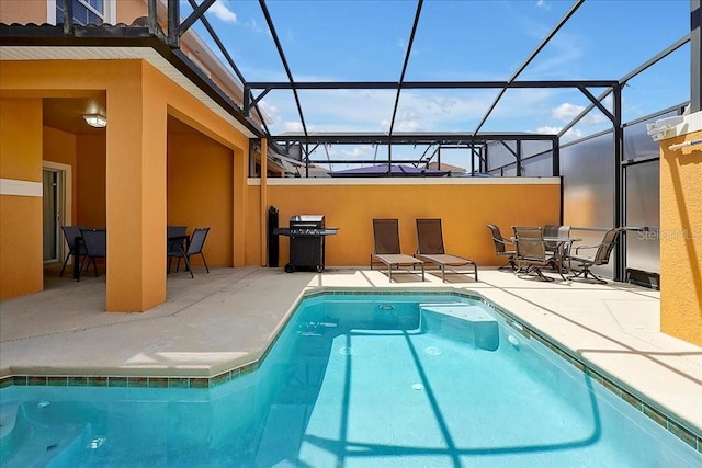 view of pool featuring a lanai and a patio area