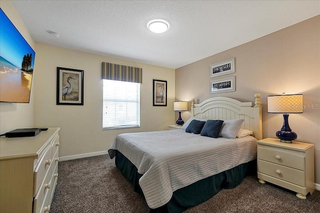 bedroom featuring dark carpet