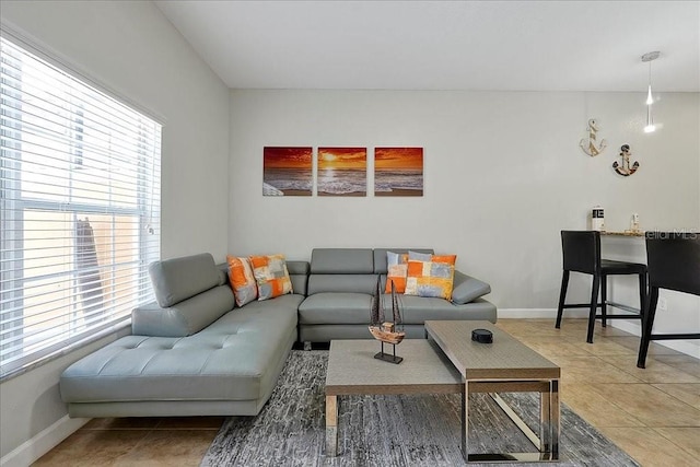 tiled living room featuring plenty of natural light