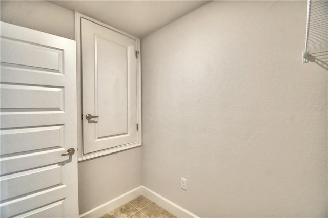 interior space featuring light tile patterned flooring