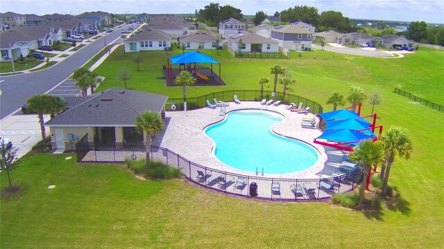 view of pool with a patio, a gazebo, and a lawn