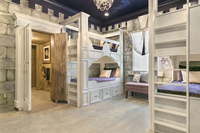 carpeted bedroom featuring a notable chandelier and crown molding