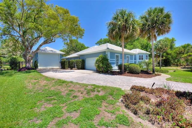 single story home with a front yard