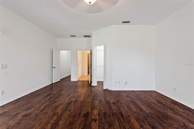 spare room featuring dark hardwood / wood-style floors