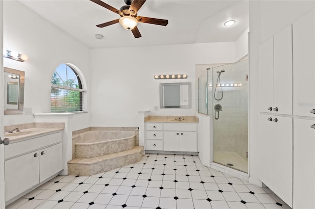 bathroom with dual vanity, tile flooring, ceiling fan, and separate shower and tub