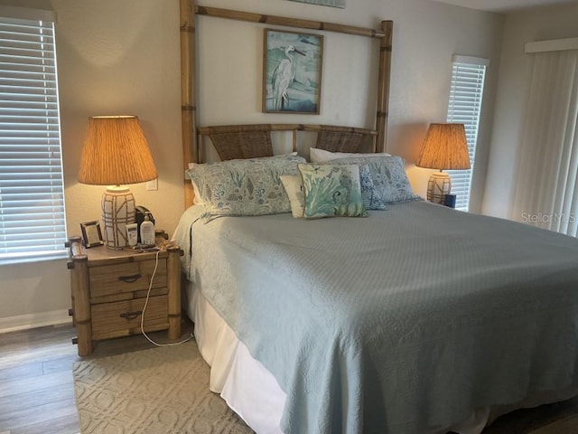 bedroom with light hardwood / wood-style flooring