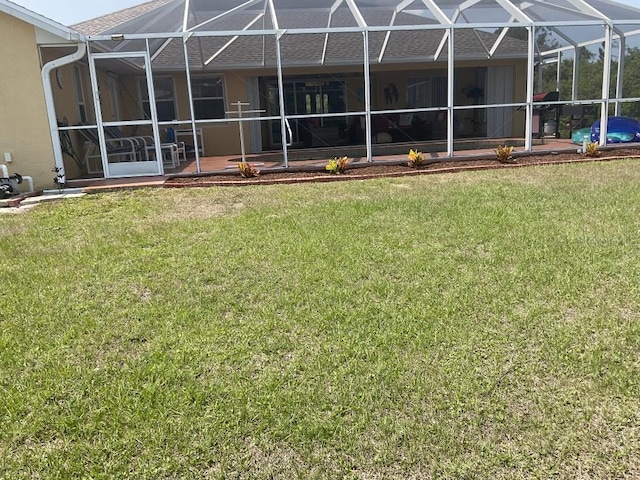 view of yard featuring a lanai