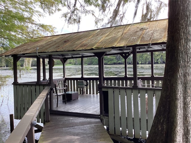 view of dock with a water view