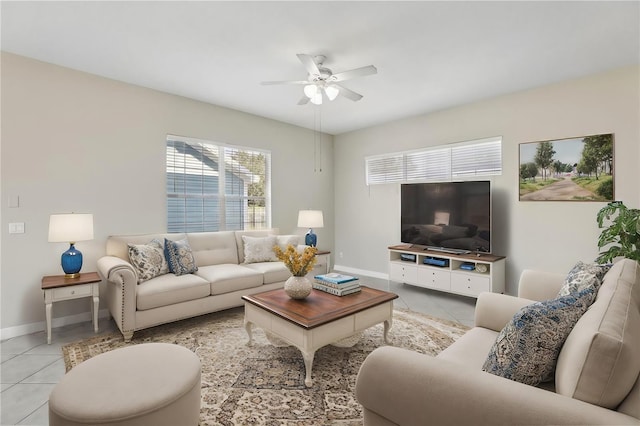 tiled living room featuring ceiling fan