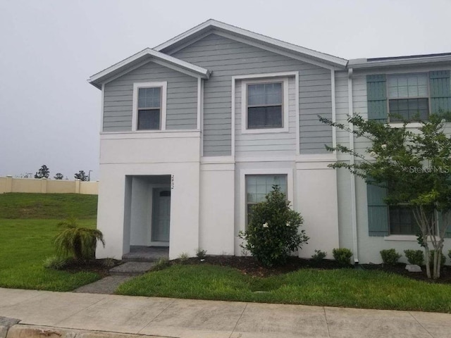 view of front facade with a front yard