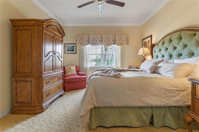 carpeted bedroom with crown molding and ceiling fan