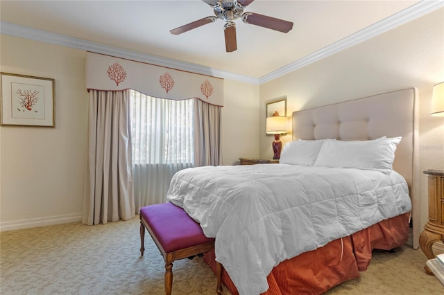 carpeted bedroom featuring ornamental molding and ceiling fan