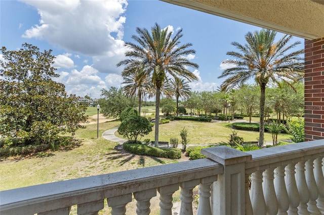 view of yard featuring a balcony