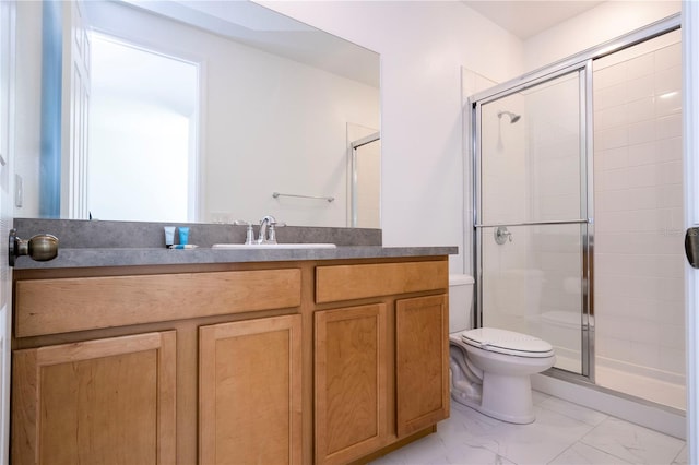 bathroom with a shower with door, toilet, tile flooring, and vanity