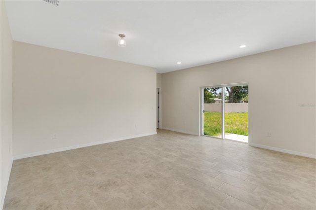 view of tiled spare room