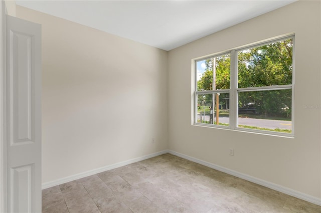 view of tiled spare room