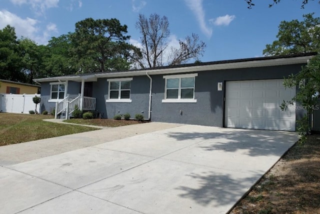 single story home featuring a garage