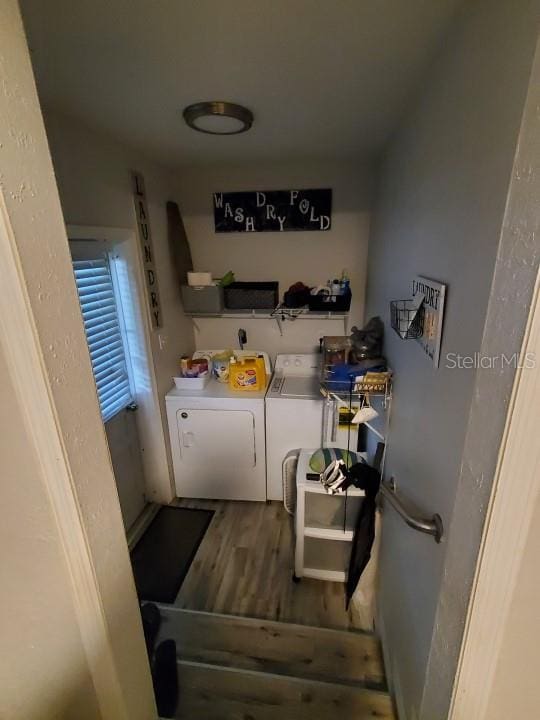 interior space featuring washer and dryer and dark wood-type flooring