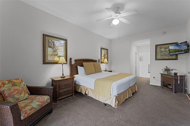 carpeted bedroom with ensuite bathroom and ceiling fan