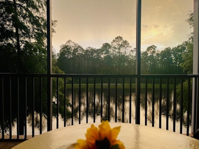 balcony at dusk with a water view