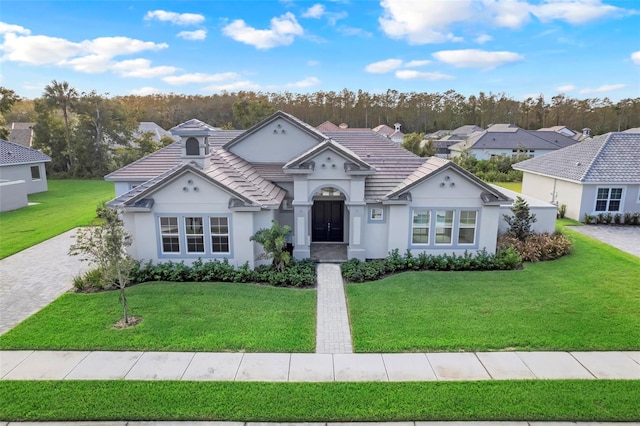 view of front of home with a front yard