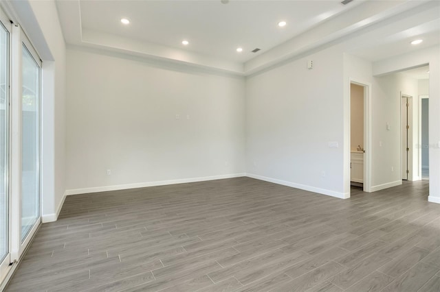 spare room featuring light wood-type flooring